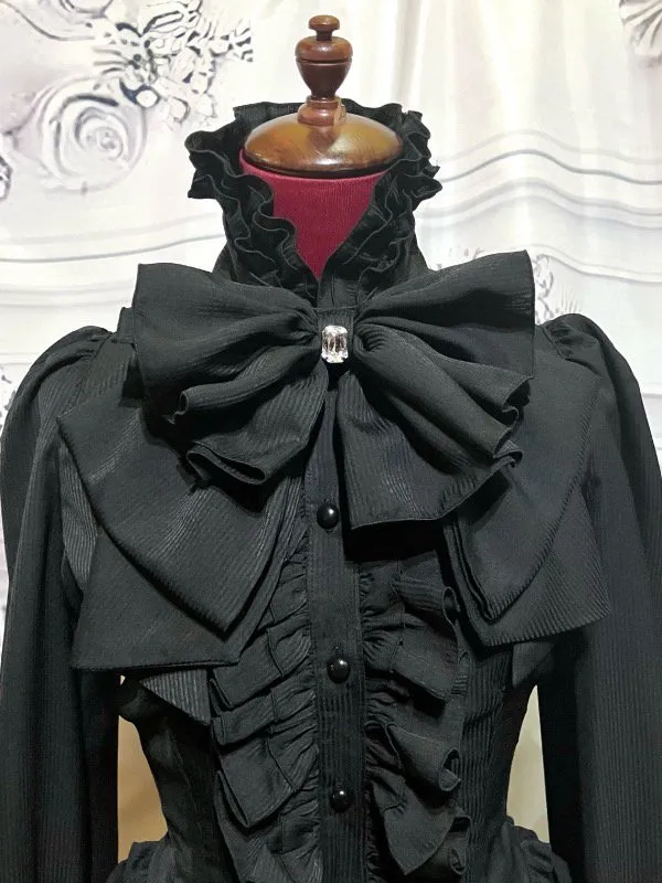 【MARBLE】マーブル ビジュー付きリボンタイフリルブラウス:黒ストライプ