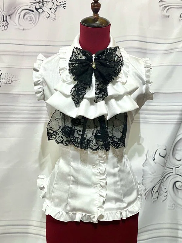 【MARBLE】マーブル 蝶型コサージュフリルタイ付きノースリーブブラウス:白黒