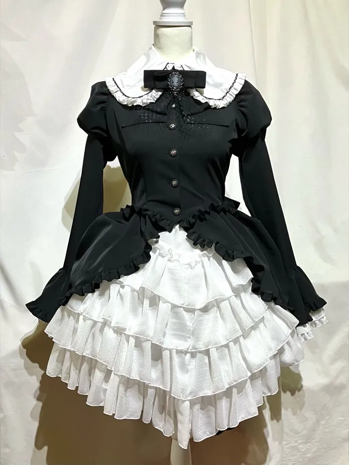 【MARBLE】マーブル カメオタイ付きクラシカルバッスルリボンワンピース +レイヤードV字フェミニンスカート:黒×白刺繍柄フリル