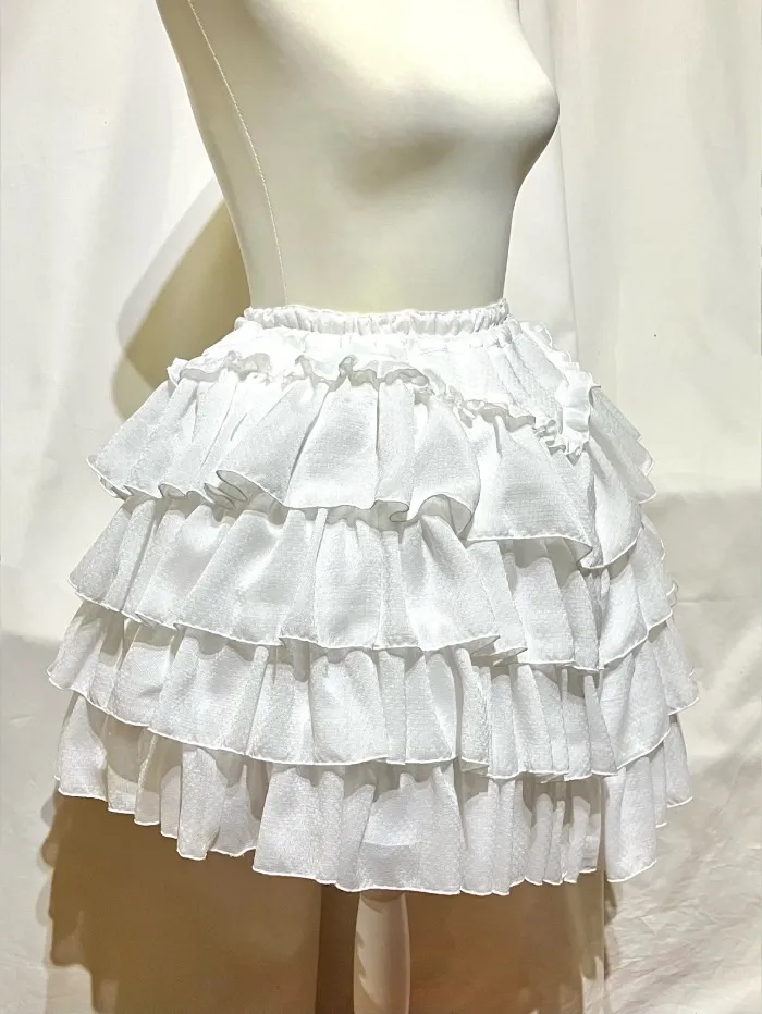 [Marble] Jupe féminine en forme de V en couches en marbre: Ruffles à motif brodé blanc