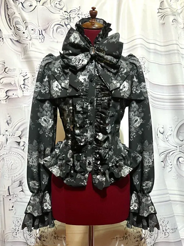 【MARBLE】マーブル　ビジュー付きリボンタイフリルブラウス黒地グレーバラ